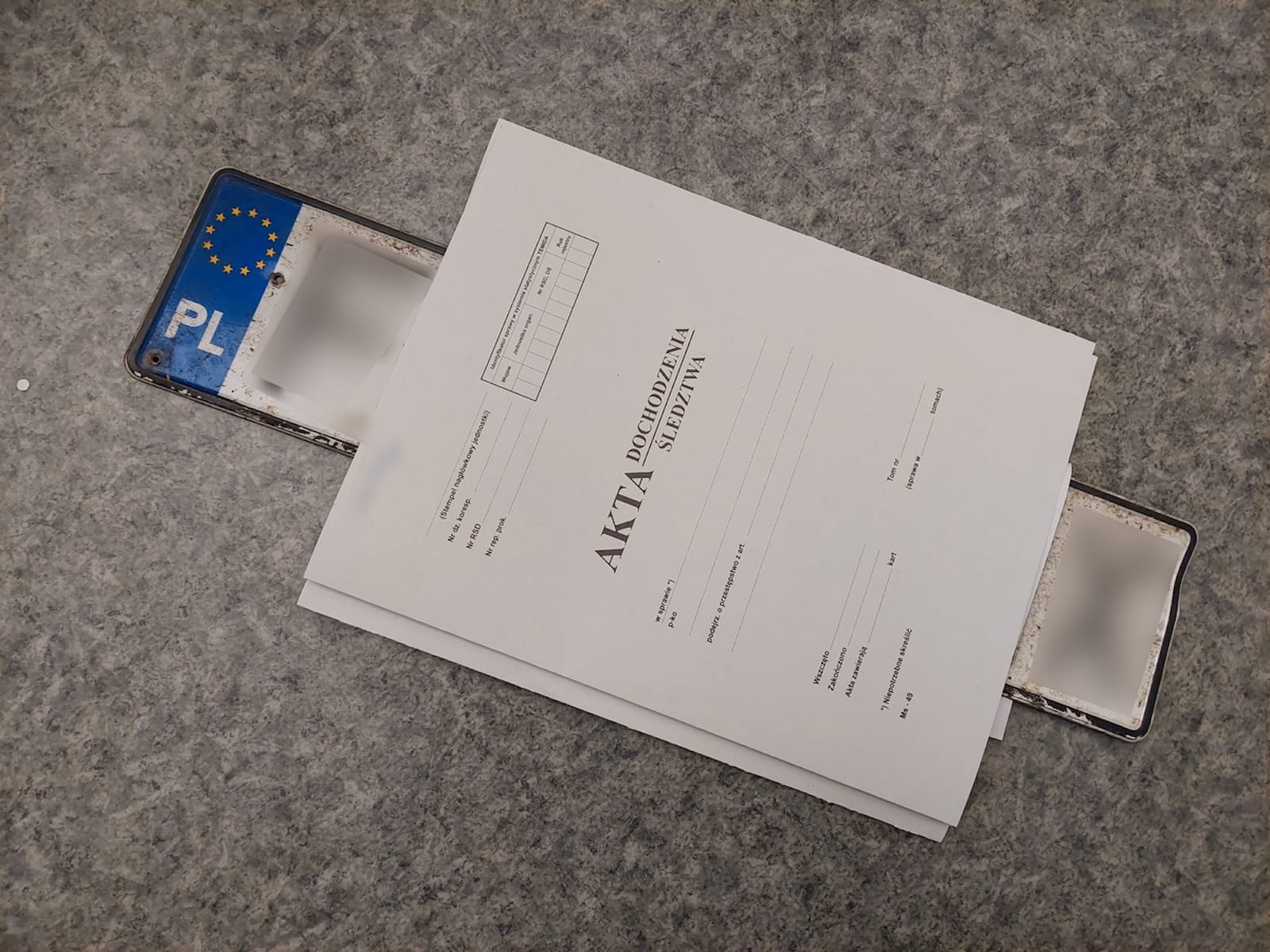 akta sprawy posługiwanie się tablicą przypisaną do innego auta