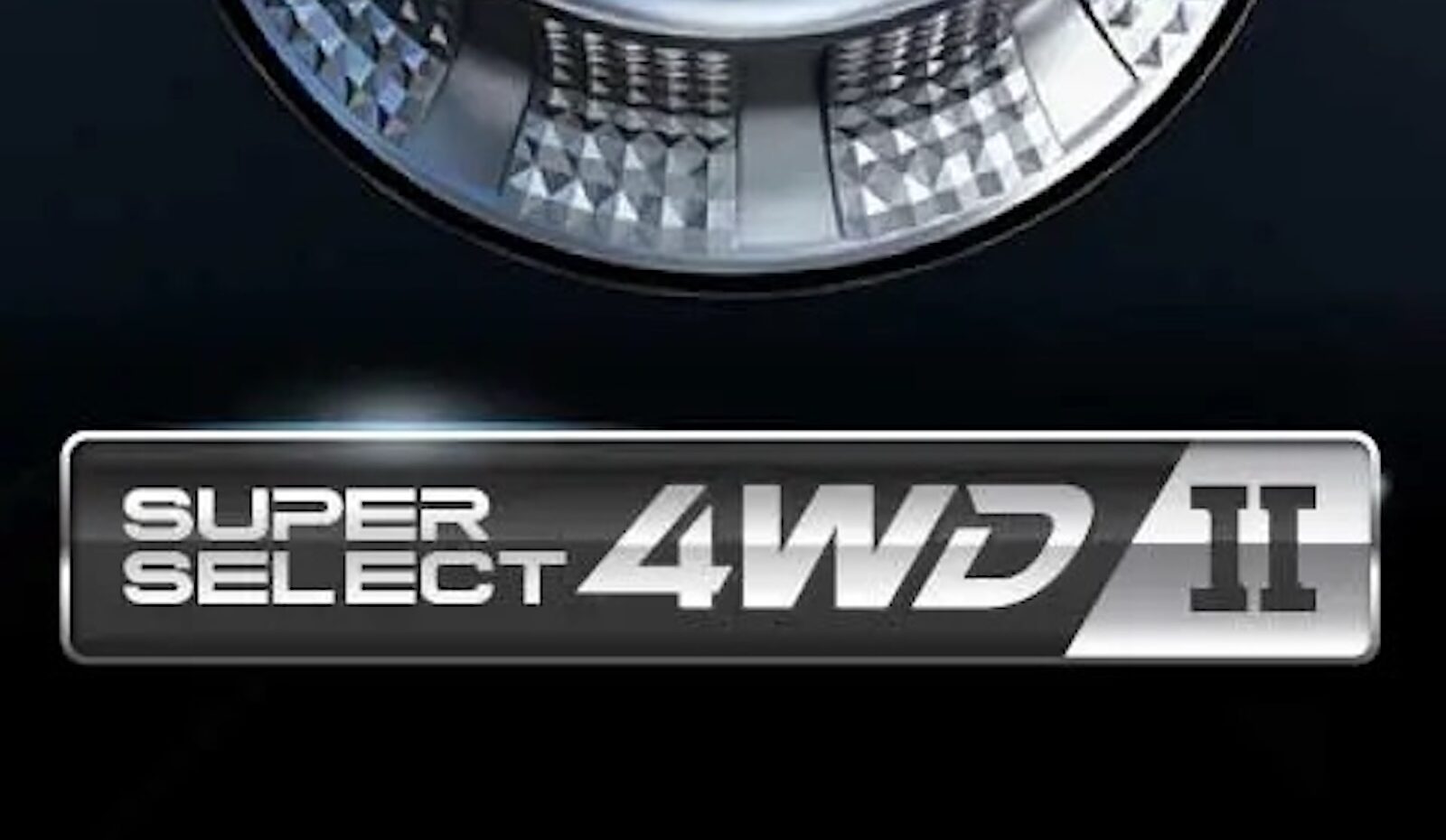 Pokrętło Mitsubishi służące do wyboru trybów jazdy 2H, 4H, 4HLC, 4LLC, z napisem „Super Select”.